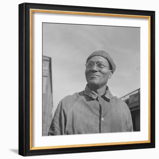 Steel car repairer and rivet driver, at the car shops of the Atchison, Topeka and Santa Fe Railroad-Jack Delano-Framed Photographic Print