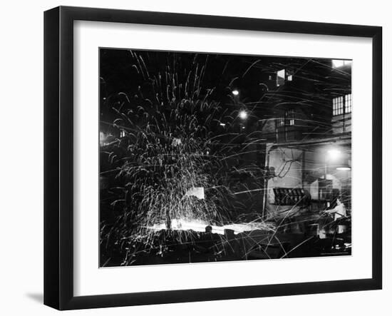 Steel Worker Mrs. Florence Romanowski Operating Stamping Machine that brands into steels-Margaret Bourke-White-Framed Photographic Print