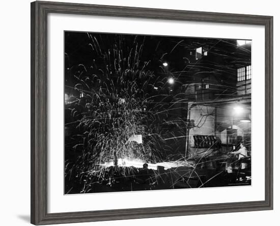 Steel Worker Mrs. Florence Romanowski Operating Stamping Machine that brands into steels-Margaret Bourke-White-Framed Photographic Print