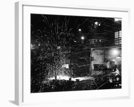 Steel Worker Mrs. Florence Romanowski Operating Stamping Machine that brands into steels-Margaret Bourke-White-Framed Photographic Print