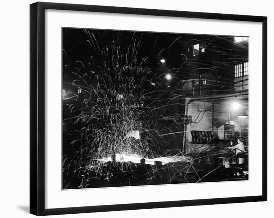 Steel Worker Mrs. Florence Romanowski Operating Stamping Machine that brands into steels-Margaret Bourke-White-Framed Photographic Print