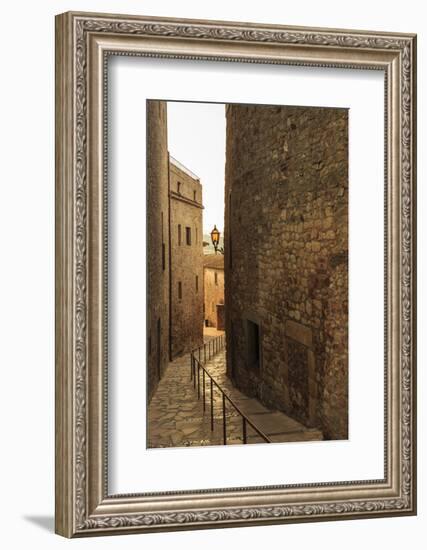 Steep and narrow winding street in gorgeous medieval hilltop walled village, Pals, Baix Emporda, Gi-Eleanor Scriven-Framed Photographic Print