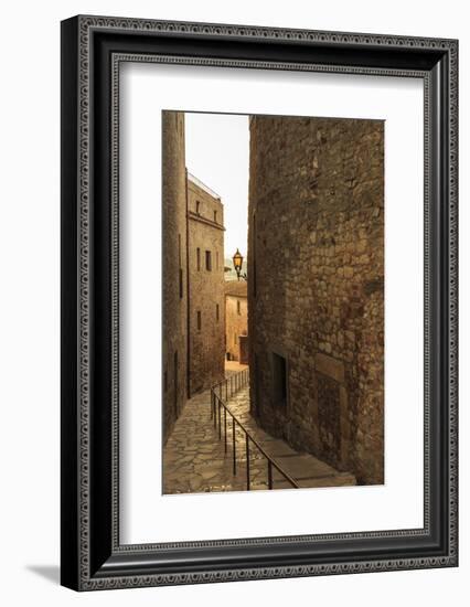 Steep and narrow winding street in gorgeous medieval hilltop walled village, Pals, Baix Emporda, Gi-Eleanor Scriven-Framed Photographic Print