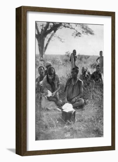 Stella Court Treatt Tending a Sick Baby, Bulawayo to Dett, Southern Rhodesia, C1924-C1925-Thomas A Glover-Framed Giclee Print