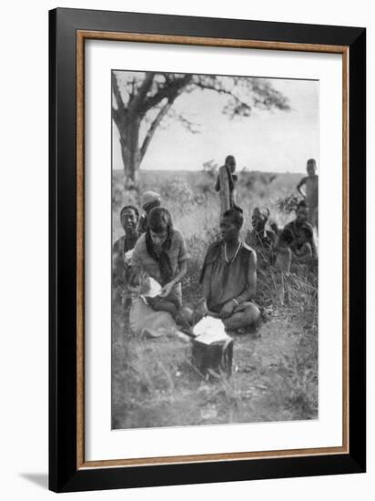 Stella Court Treatt Tending a Sick Baby, Bulawayo to Dett, Southern Rhodesia, C1924-C1925-Thomas A Glover-Framed Giclee Print