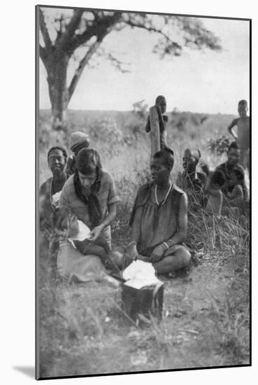 Stella Court Treatt Tending a Sick Baby, Bulawayo to Dett, Southern Rhodesia, C1924-C1925-Thomas A Glover-Mounted Giclee Print