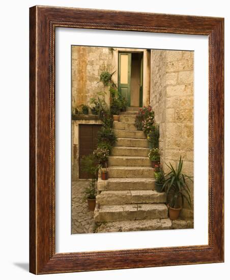 Steps with plants outside historic stone house, Trogir, Dalamatia, Croatia-Merrill Images-Framed Photographic Print