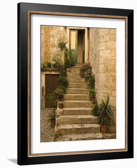 Steps with plants outside historic stone house, Trogir, Dalamatia, Croatia-Merrill Images-Framed Photographic Print