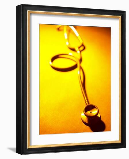 Stethoscope on Yellow Surface-null-Framed Photographic Print