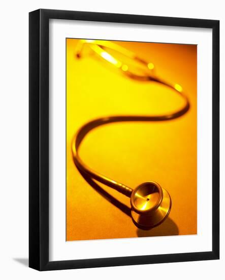 Stethoscope on Yellow Surface-null-Framed Photographic Print