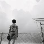 View from Behind of a Girl Holding a Soccer Ball-Steve Cicero-Photographic Print