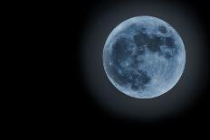 Blue Full Moon Isolated on a Black Sky-Steve Collender-Photographic Print