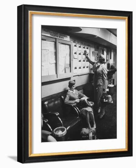 Stewardess Signing in for Flight-Peter Stackpole-Framed Premium Photographic Print