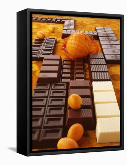 Still Life of Chocolate Bars and Citrus Fruit-Luzia Ellert-Framed Premier Image Canvas