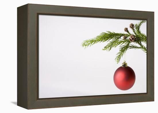 Still Life of Red Bauble Hanging on Christmas Tree-null-Framed Premier Image Canvas