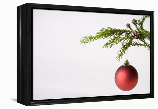 Still Life of Red Bauble Hanging on Christmas Tree-null-Framed Premier Image Canvas