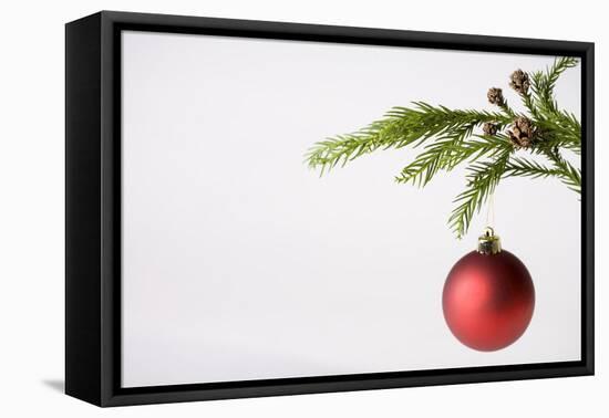 Still Life of Red Bauble Hanging on Christmas Tree-null-Framed Premier Image Canvas