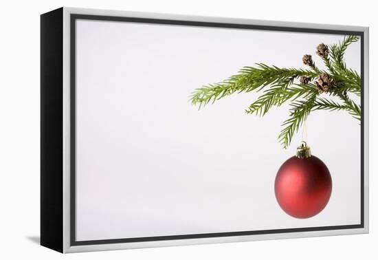 Still Life of Red Bauble Hanging on Christmas Tree-null-Framed Premier Image Canvas