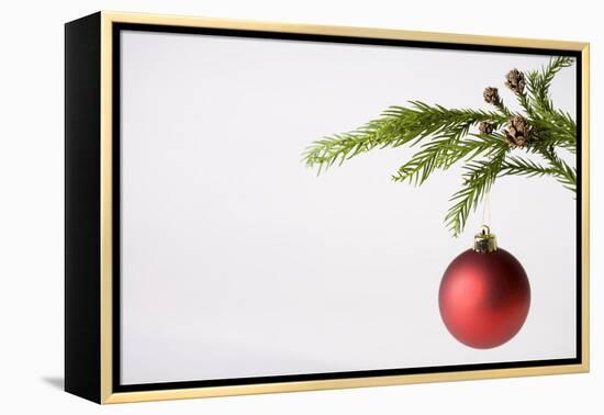 Still Life of Red Bauble Hanging on Christmas Tree-null-Framed Premier Image Canvas