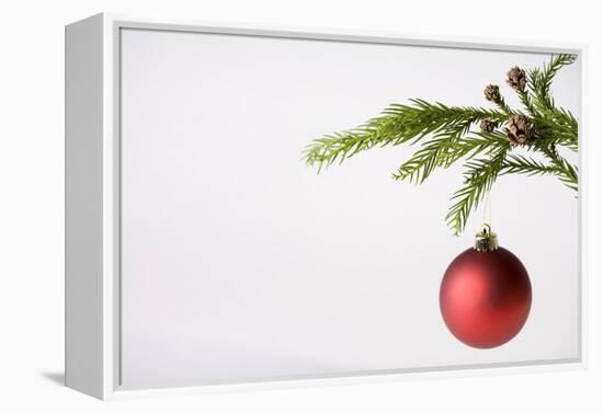 Still Life of Red Bauble Hanging on Christmas Tree-null-Framed Premier Image Canvas