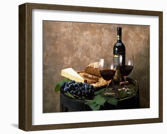 Still Life of Wine Bottle, Wine Glasses, Cheese and Purple Grapes on Top of Barrel-null-Framed Photographic Print