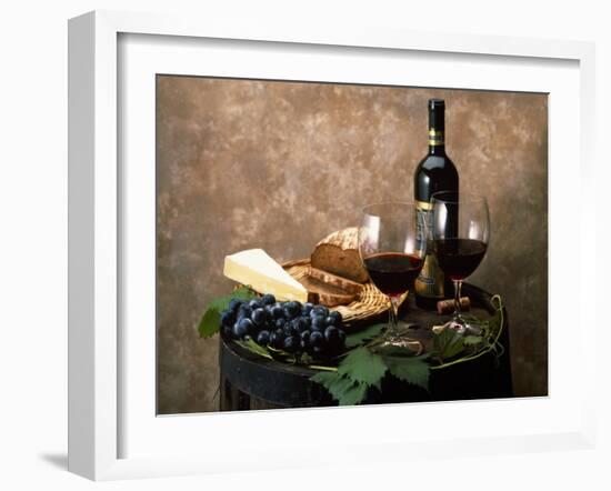 Still Life of Wine Bottle, Wine Glasses, Cheese and Purple Grapes on Top of Barrel-null-Framed Photographic Print