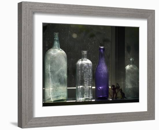 Still Life With Bottles And Found Figurines-Geoffrey Ansel Agrons-Framed Photographic Print