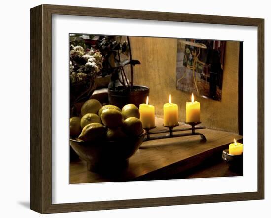 Still Life with Lighted Candles and Bowl of Lemons in Coffee Shop, Tallinn, Estonia-Nancy & Steve Ross-Framed Photographic Print