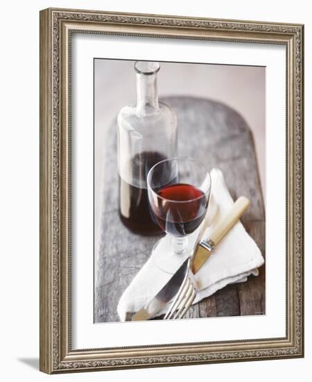 Still Life with Red Wine Glass, Wine Carafe, Napkin and Cutlery-Jean Cazals-Framed Photographic Print