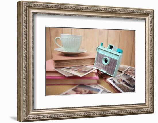 Still Life with Vintage Camera and Photos. Blur Effect, Focus on Camera-soupstock-Framed Photographic Print