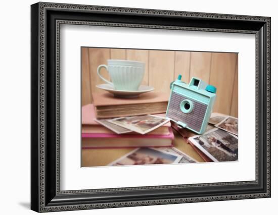 Still Life with Vintage Camera and Photos. Blur Effect, Focus on Camera-soupstock-Framed Photographic Print