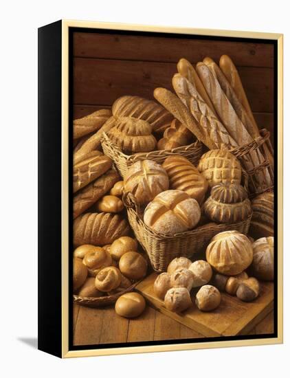 Still Life with White Bread, Bread Rolls & Bread Sticks-Gerrit Buntrock-Framed Premier Image Canvas