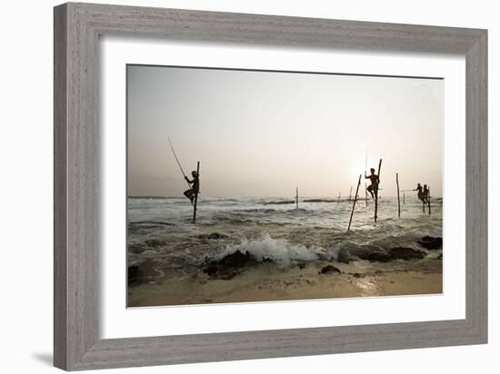 Stilt fisherman in Sri Lanka-Rasmus Kaessmann-Framed Photographic Print