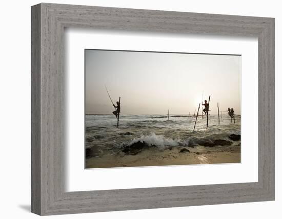 Stilt fisherman in Sri Lanka-Rasmus Kaessmann-Framed Photographic Print