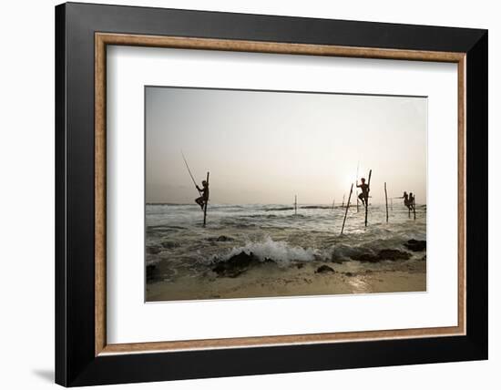 Stilt fisherman in Sri Lanka-Rasmus Kaessmann-Framed Photographic Print