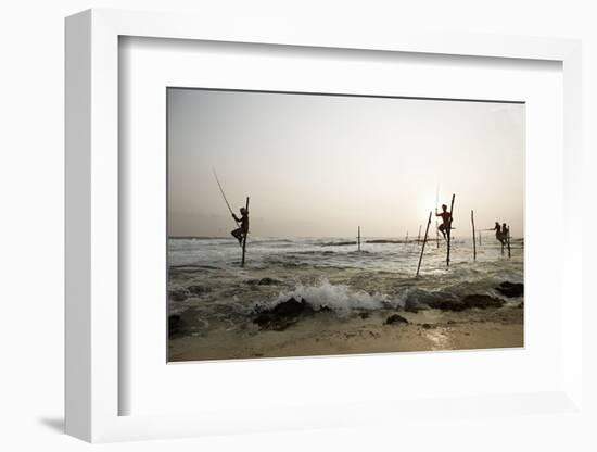 Stilt fisherman in Sri Lanka-Rasmus Kaessmann-Framed Photographic Print