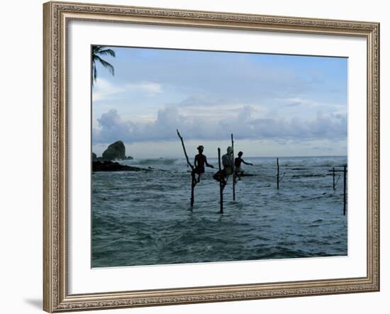 Stilt Fishermen Fishing from Their Poles Between Unawatuna and Weligama, Sri Lanka-Yadid Levy-Framed Photographic Print