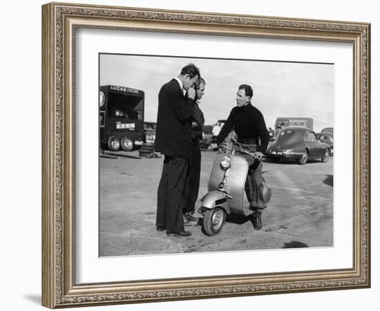 Stirling Moss on a Vespa Scooter, Goodwood, April 1952-null-Framed Photographic Print