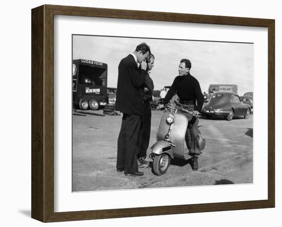 Stirling Moss on a Vespa Scooter, Goodwood, April 1952-null-Framed Photographic Print