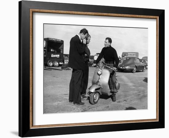 Stirling Moss on a Vespa Scooter, Goodwood, April 1952-null-Framed Photographic Print