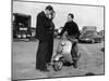 Stirling Moss on a Vespa Scooter, Goodwood, April 1952-null-Mounted Photographic Print