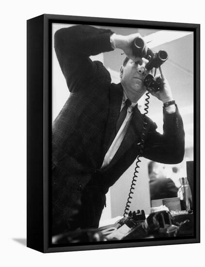 Stock Market Salesman with Binoculars-Yale Joel-Framed Premier Image Canvas