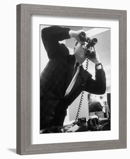 Stock Market Salesman with Binoculars-Yale Joel-Framed Photographic Print