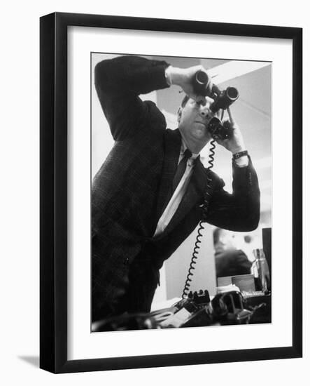 Stock Market Salesman with Binoculars-Yale Joel-Framed Photographic Print