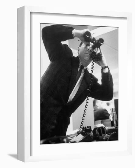 Stock Market Salesman with Binoculars-Yale Joel-Framed Photographic Print