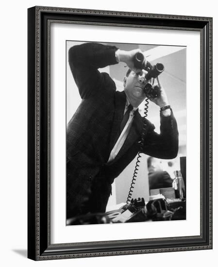 Stock Market Salesman with Binoculars-Yale Joel-Framed Photographic Print