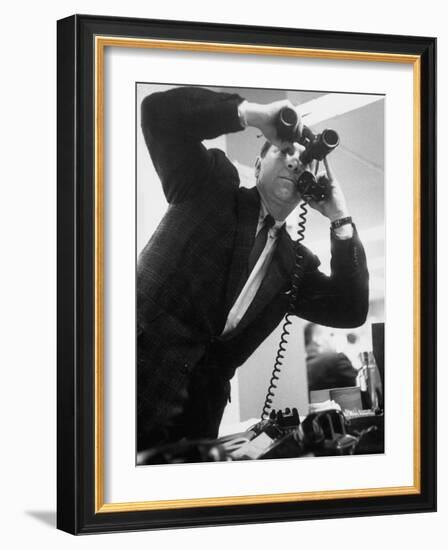 Stock Market Salesman with Binoculars-Yale Joel-Framed Photographic Print