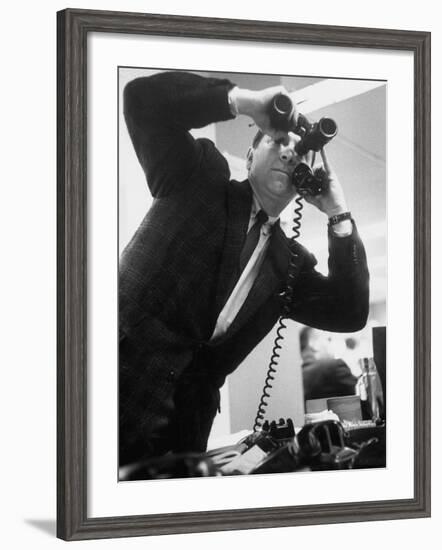 Stock Market Salesman with Binoculars-Yale Joel-Framed Photographic Print