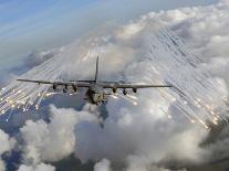 An AC-130U Gunship Jettisons Flares Over Florida-Stocktrek Images-Photographic Print