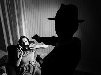 Killer Pointing the Gun at a Terrified Woman-stokkete-Laminated Photographic Print